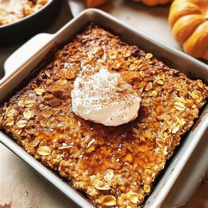 Baked pumpkin oatmeal in a casserole dish.