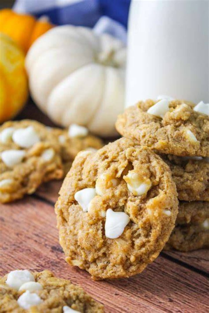 Pumpkin oatmeal in a white bowl.