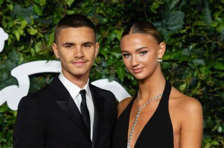 Romeo Beckham with Mia Regan