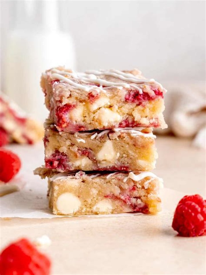 Stack of white chocolate raspberry cookies.